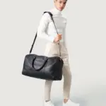 Black leather duffle bag with leather handles