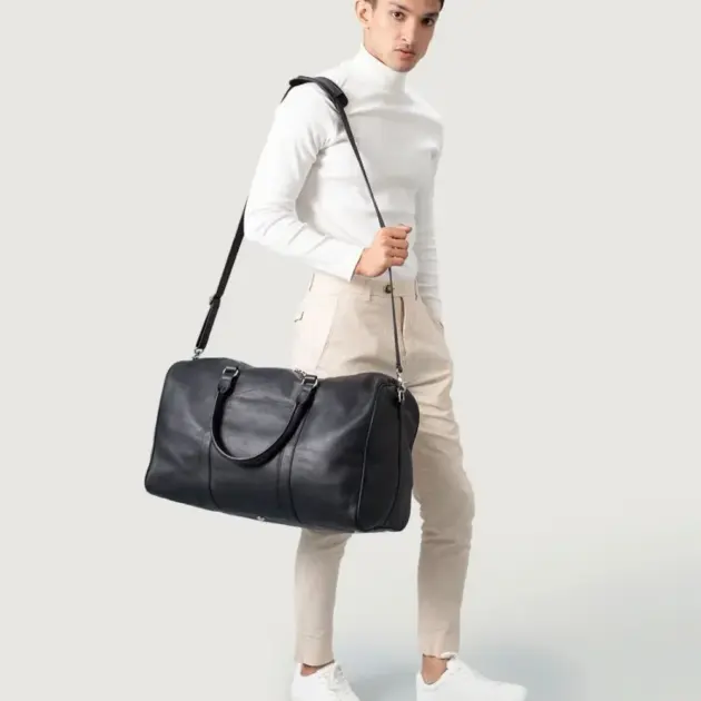 Black leather duffle bag with leather handles