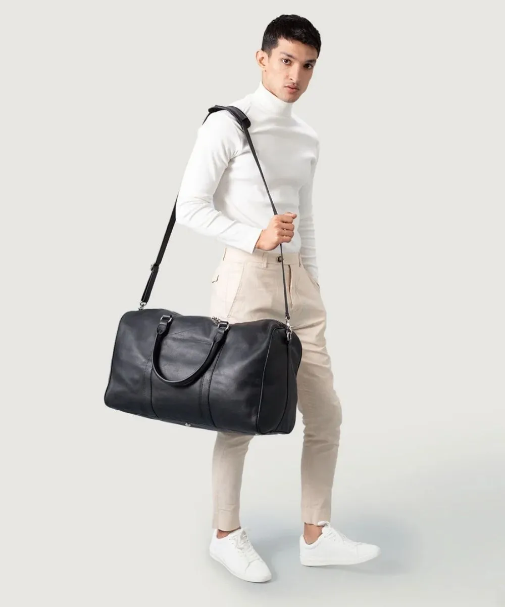 Black leather duffle bag with leather handles