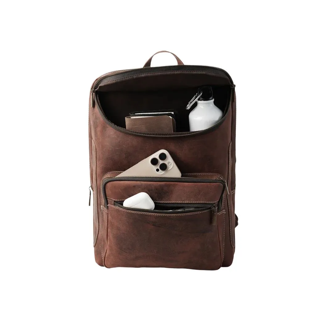 Leather backpack interior with multiple storage compartments