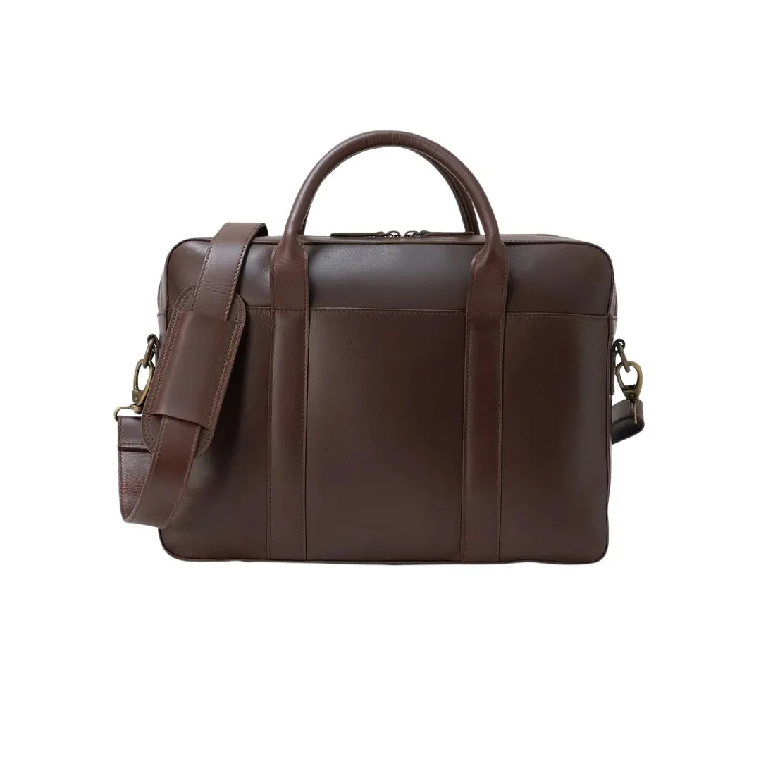 Vintage leather briefcase with top handle and spacious business design
