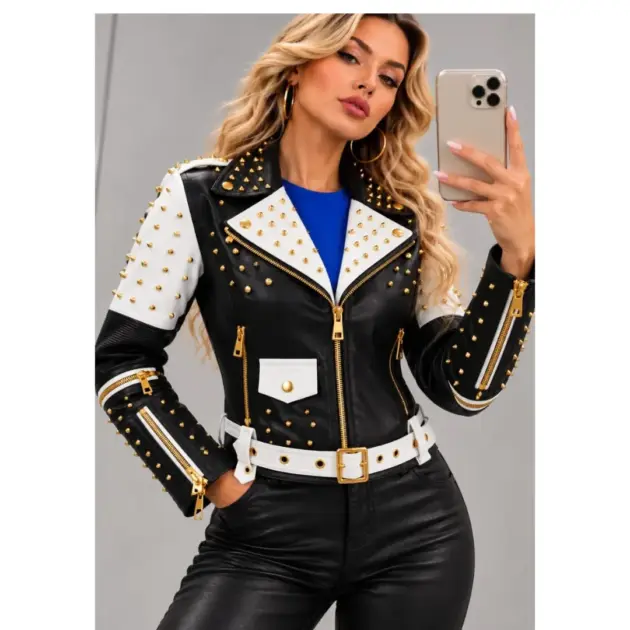 Black and white studded leather jacket for women with gold zippers and decorative studs front view